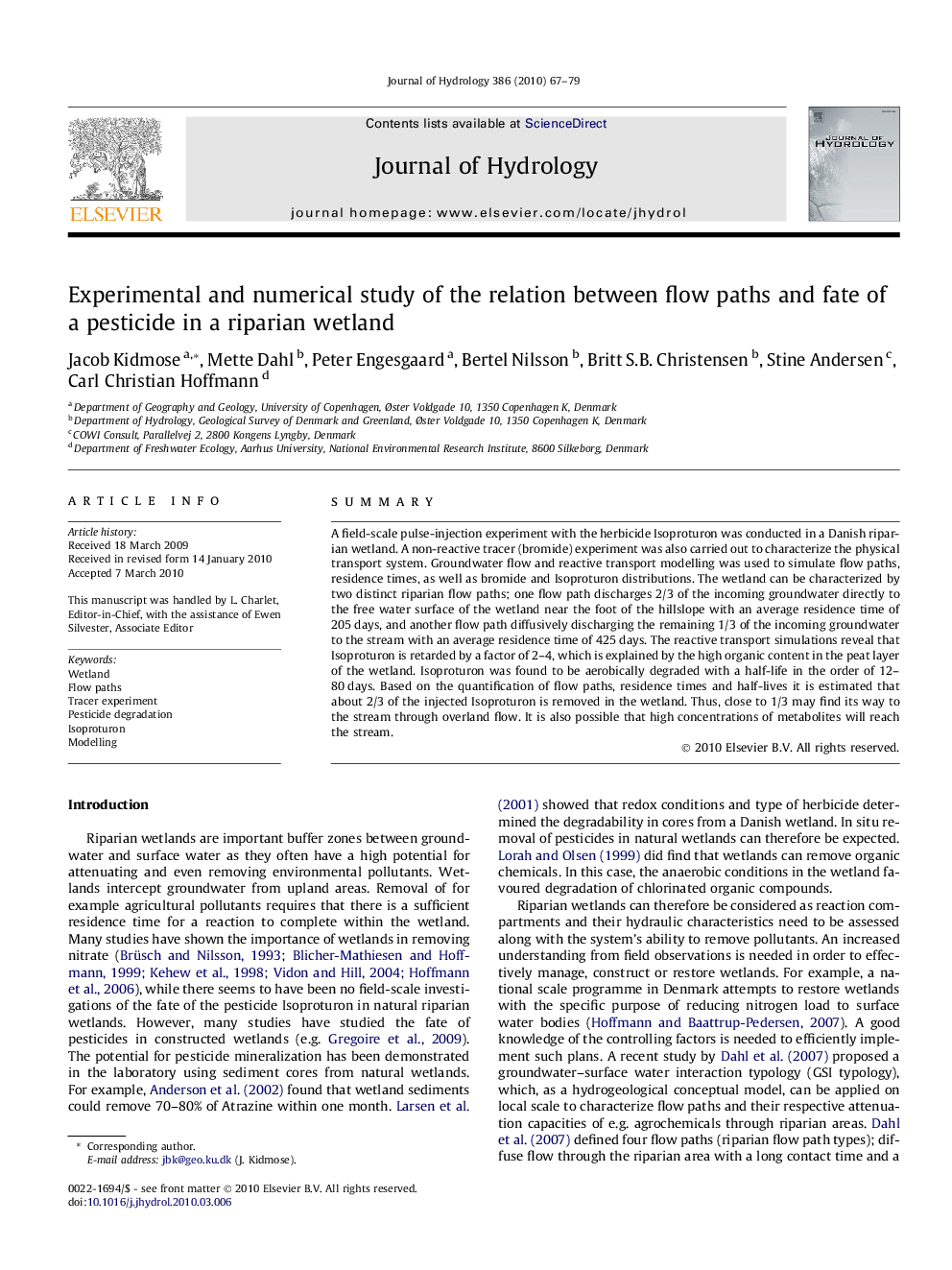 Experimental and numerical study of the relation between flow paths and fate of a pesticide in a riparian wetland