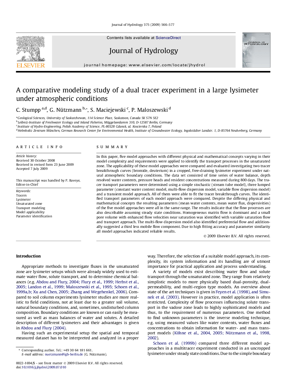 A comparative modeling study of a dual tracer experiment in a large lysimeter under atmospheric conditions