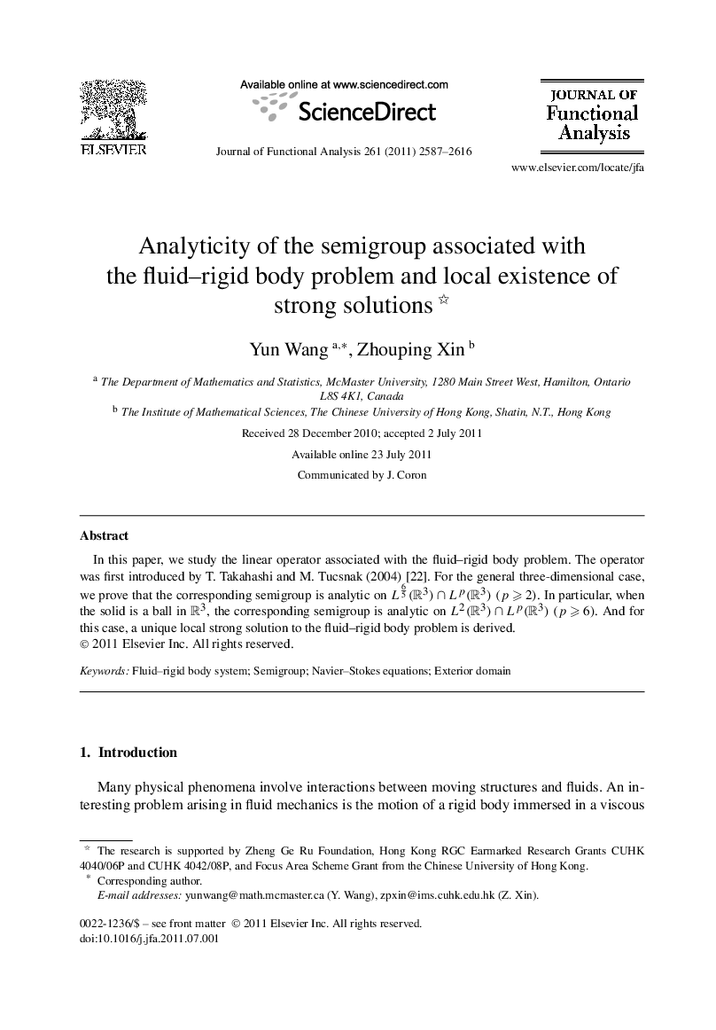 Analyticity of the semigroup associated with the fluid–rigid body problem and local existence of strong solutions 