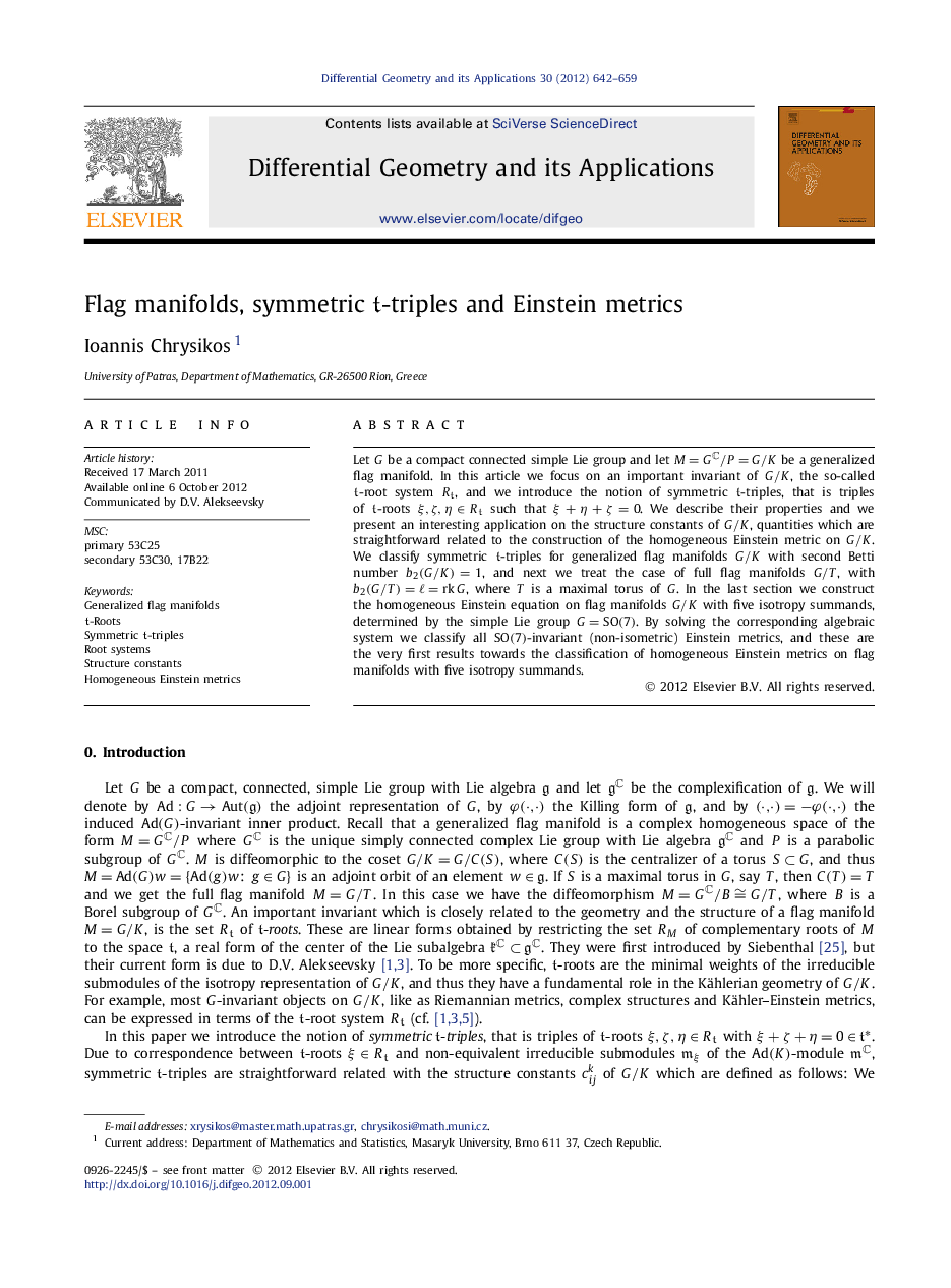 Flag manifolds, symmetric tt-triples and Einstein metrics