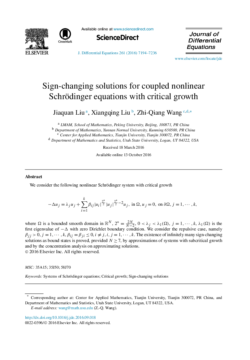 Sign-changing solutions for coupled nonlinear Schrödinger equations with critical growth