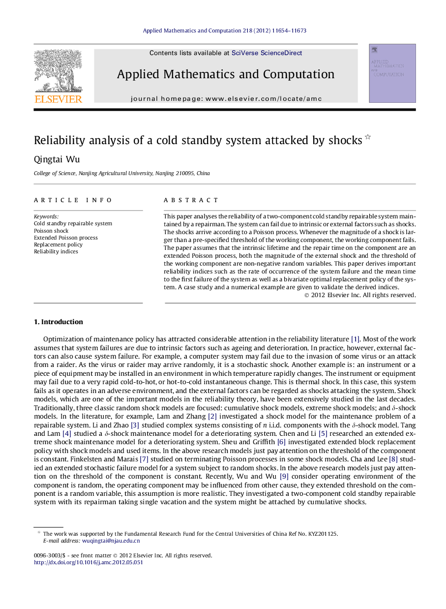 Reliability analysis of a cold standby system attacked by shocks 