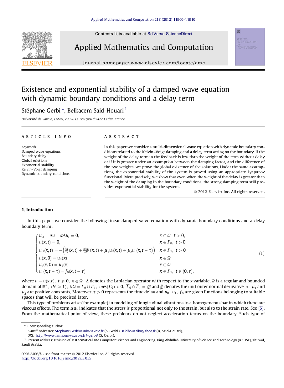 Existence and exponential stability of a damped wave equation with dynamic boundary conditions and a delay term