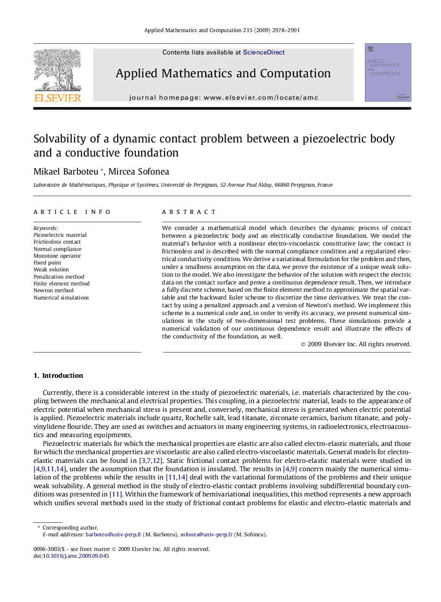 Solvability of a dynamic contact problem between a piezoelectric body and a conductive foundation