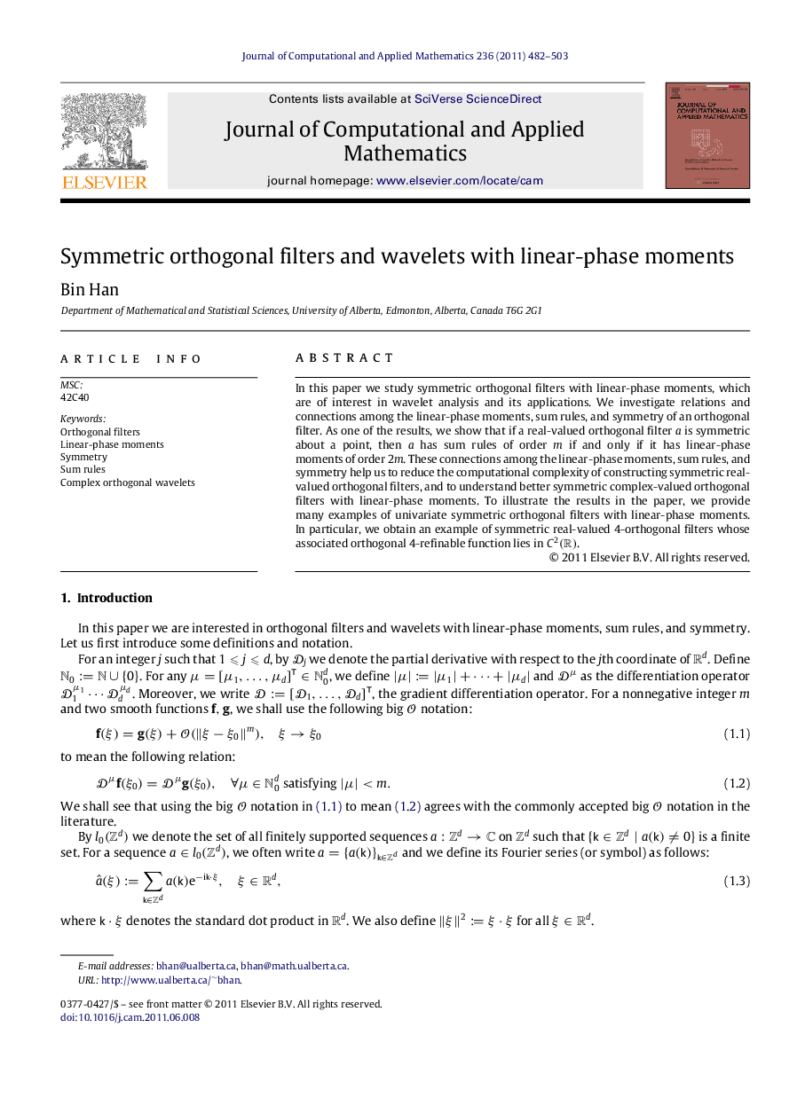 Symmetric orthogonal filters and wavelets with linear-phase moments