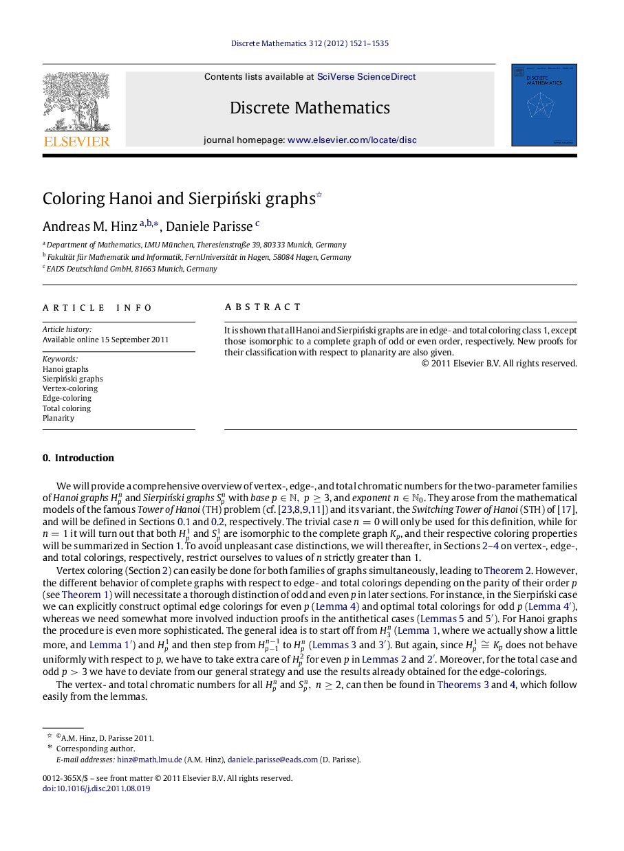 Coloring Hanoi and Sierpiński graphs 