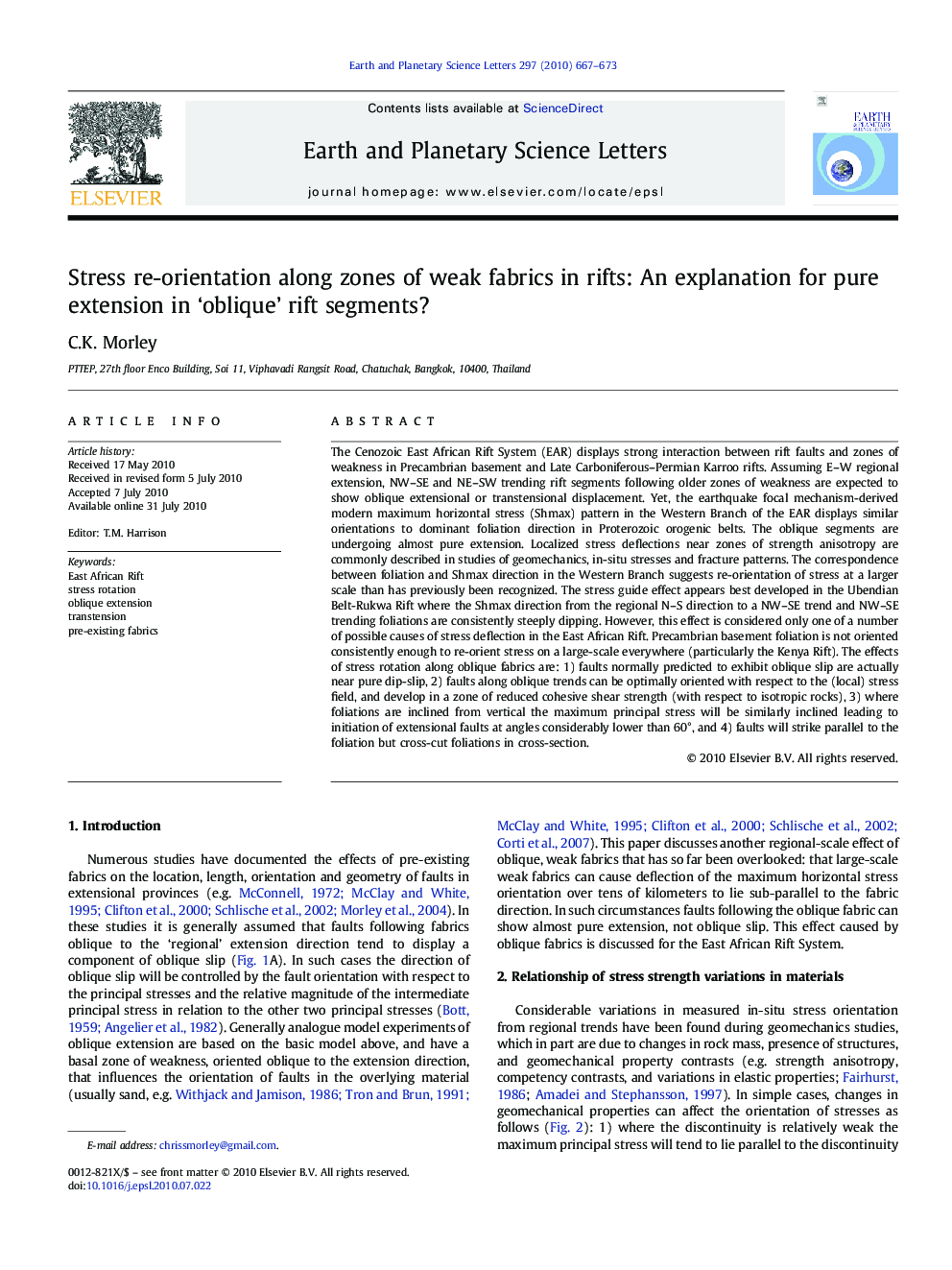 Stress re-orientation along zones of weak fabrics in rifts: An explanation for pure extension in ‘oblique’ rift segments?