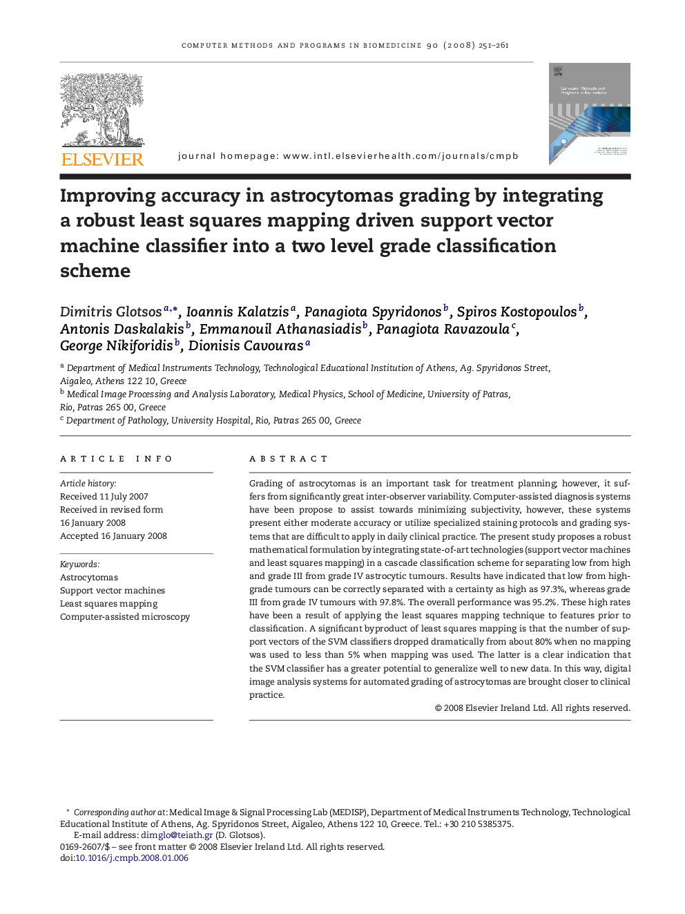 Improving accuracy in astrocytomas grading by integrating a robust least squares mapping driven support vector machine classifier into a two level grade classification scheme