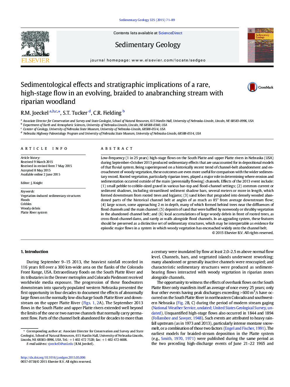 Sedimentological effects and stratigraphic implications of a rare, high-stage flow in an evolving, braided to anabranching stream with riparian woodland