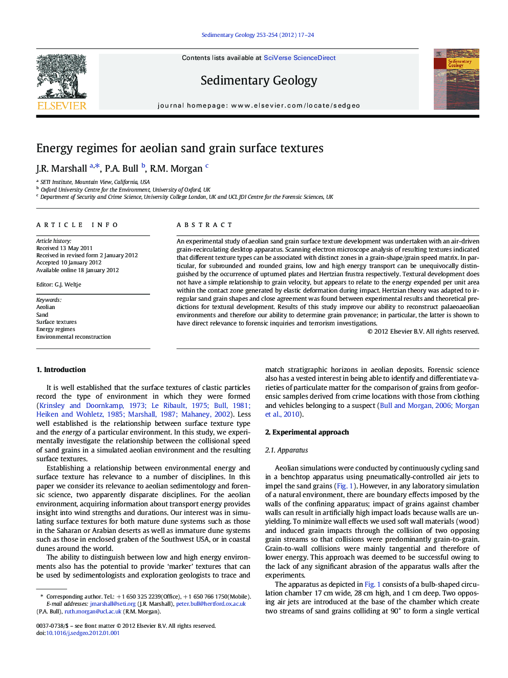 Energy regimes for aeolian sand grain surface textures