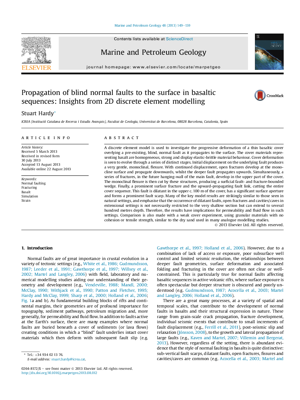 Propagation of blind normal faults to the surface in basaltic sequences: Insights from 2D discrete element modelling