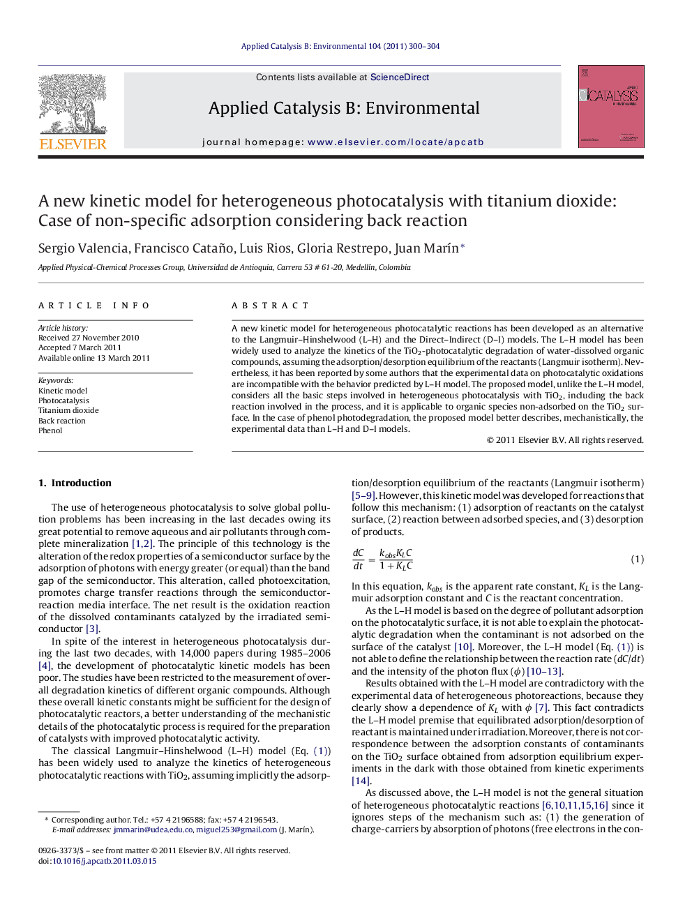 A new kinetic model for heterogeneous photocatalysis with titanium dioxide: Case of non-specific adsorption considering back reaction