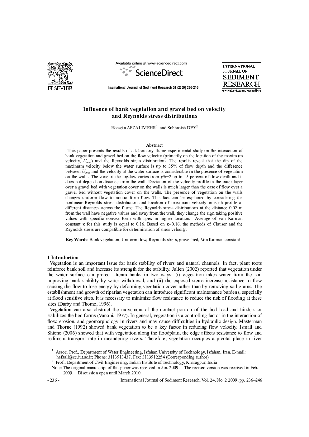 Influence of bank vegetation and gravel bed on velocity and Reynolds stress distributions 