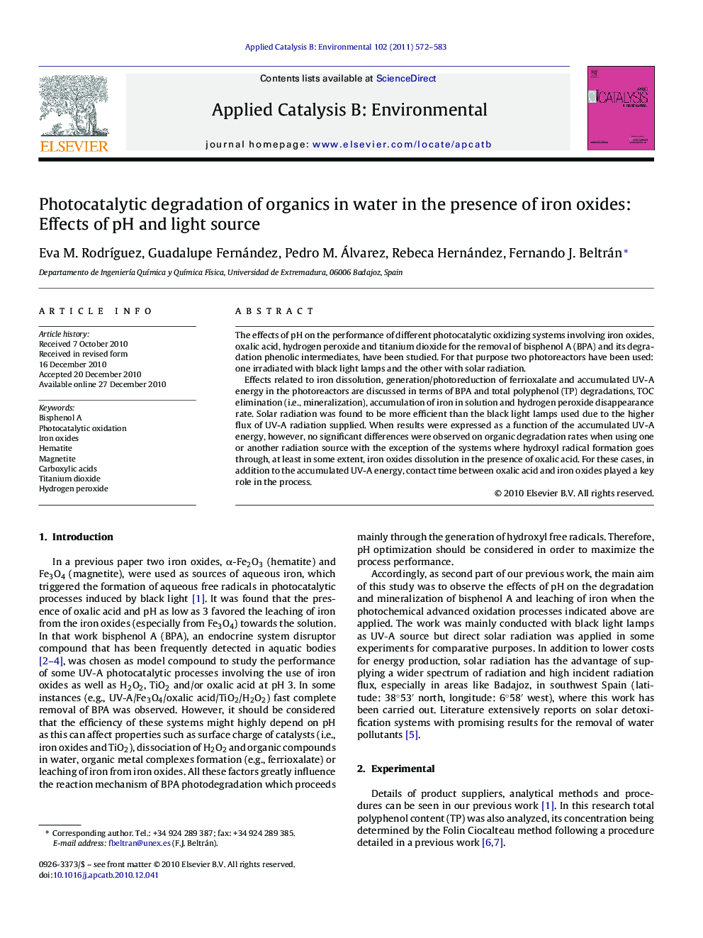 Photocatalytic degradation of organics in water in the presence of iron oxides: Effects of pH and light source