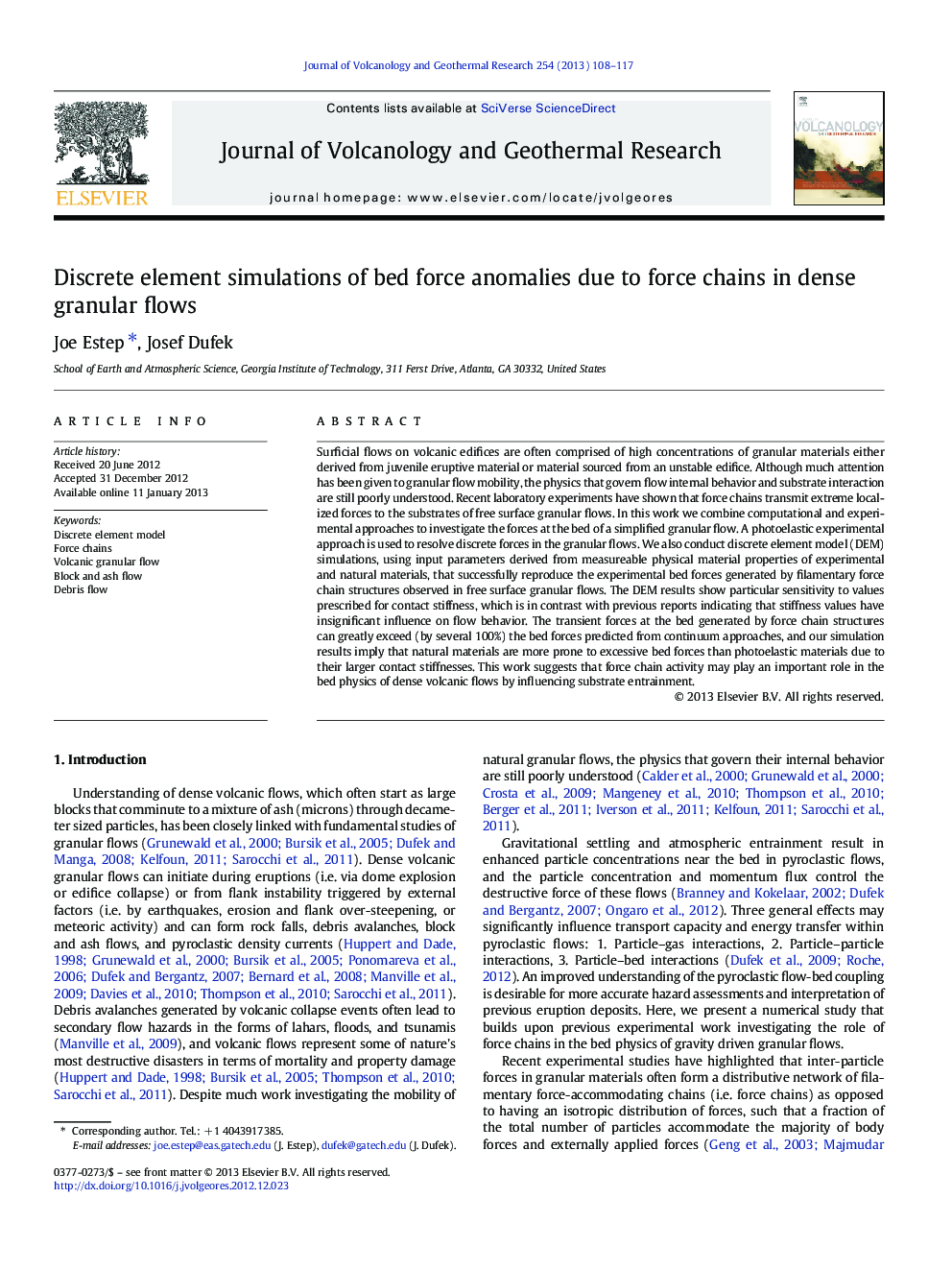 Discrete element simulations of bed force anomalies due to force chains in dense granular flows