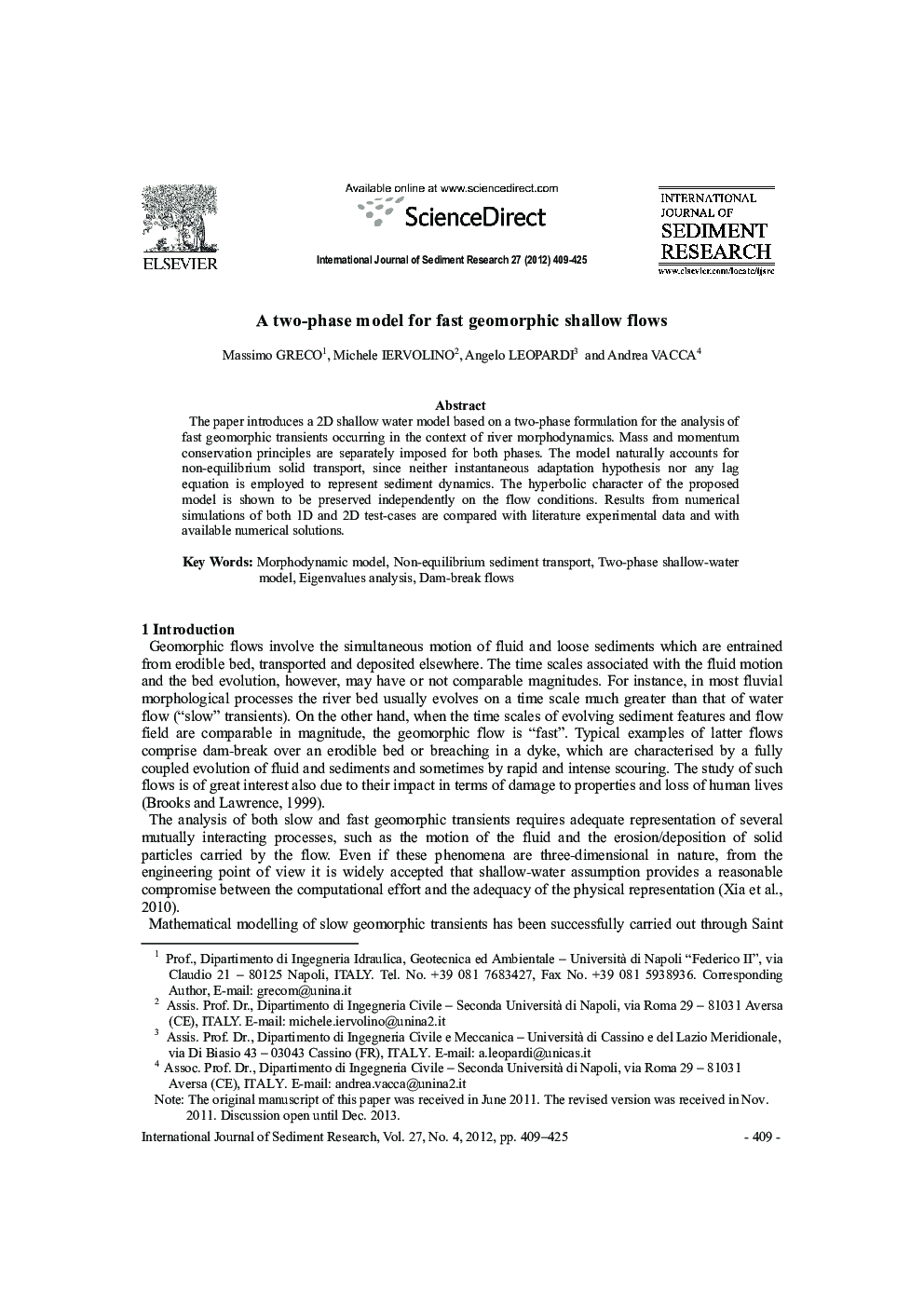 A two-phase model for fast geomorphic shallow flows 