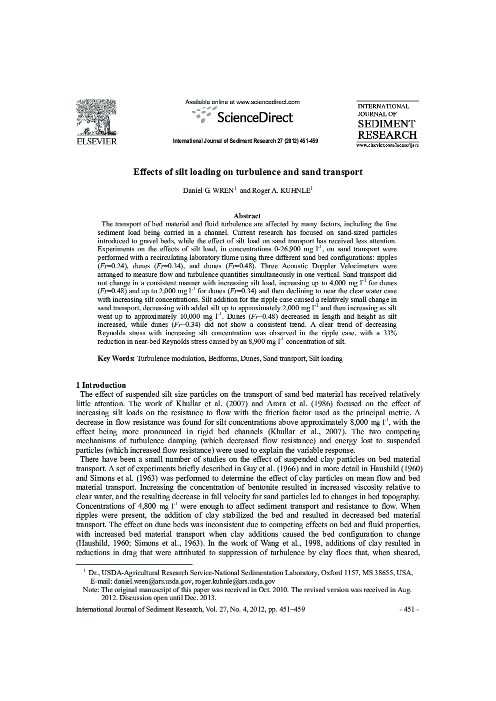 Effects of silt loading on turbulence and sand transport 