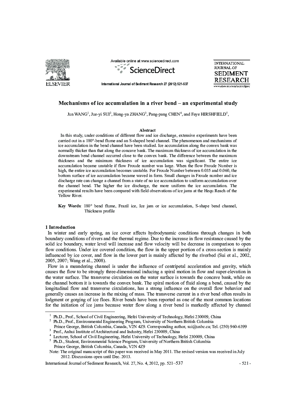 Mechanisms of ice accumulation in a river bend – an experimental study 
