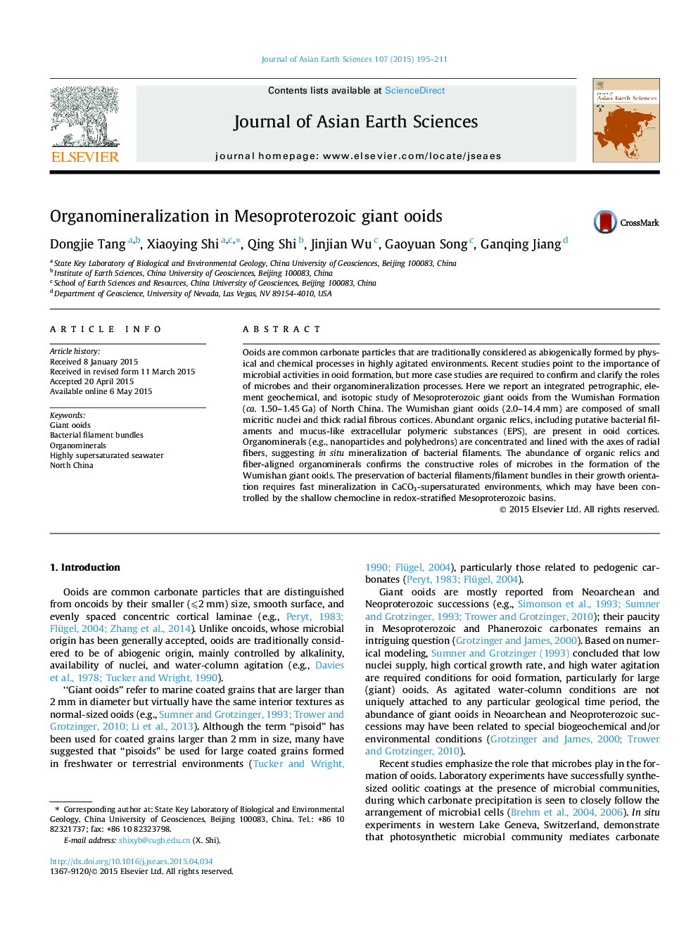 Organomineralization in Mesoproterozoic giant ooids