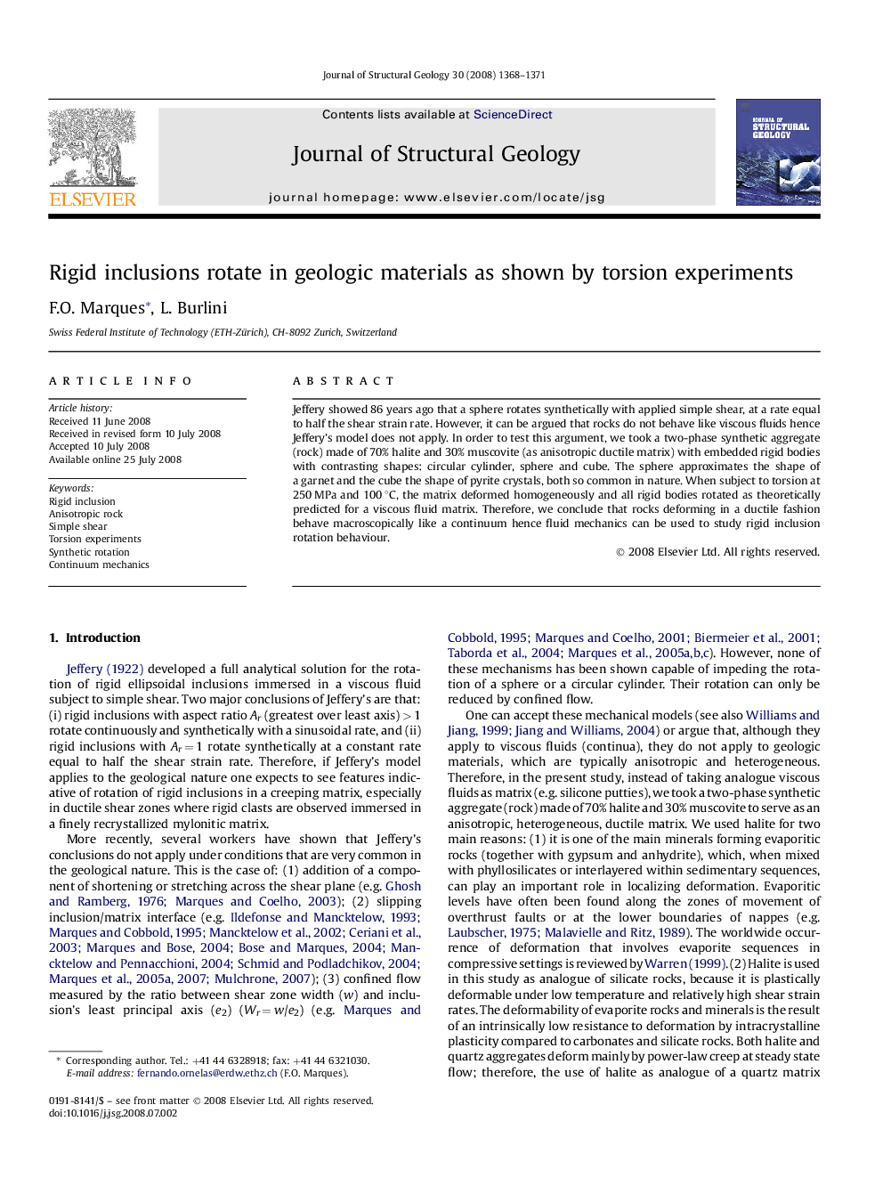 Rigid inclusions rotate in geologic materials as shown by torsion experiments