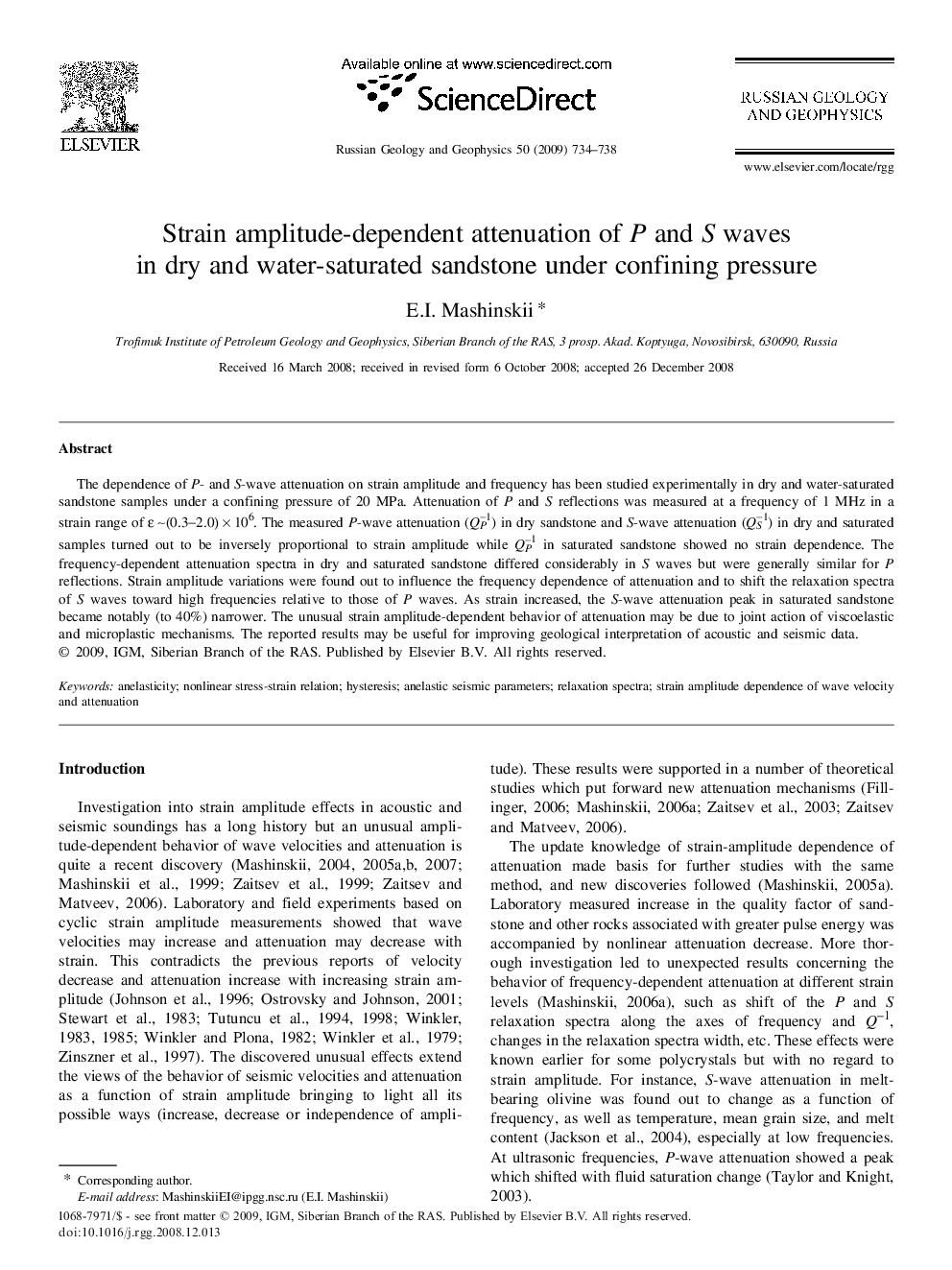 Strain amplitude-dependent attenuation of P and S waves in dry and water-saturated sandstone under confining pressure