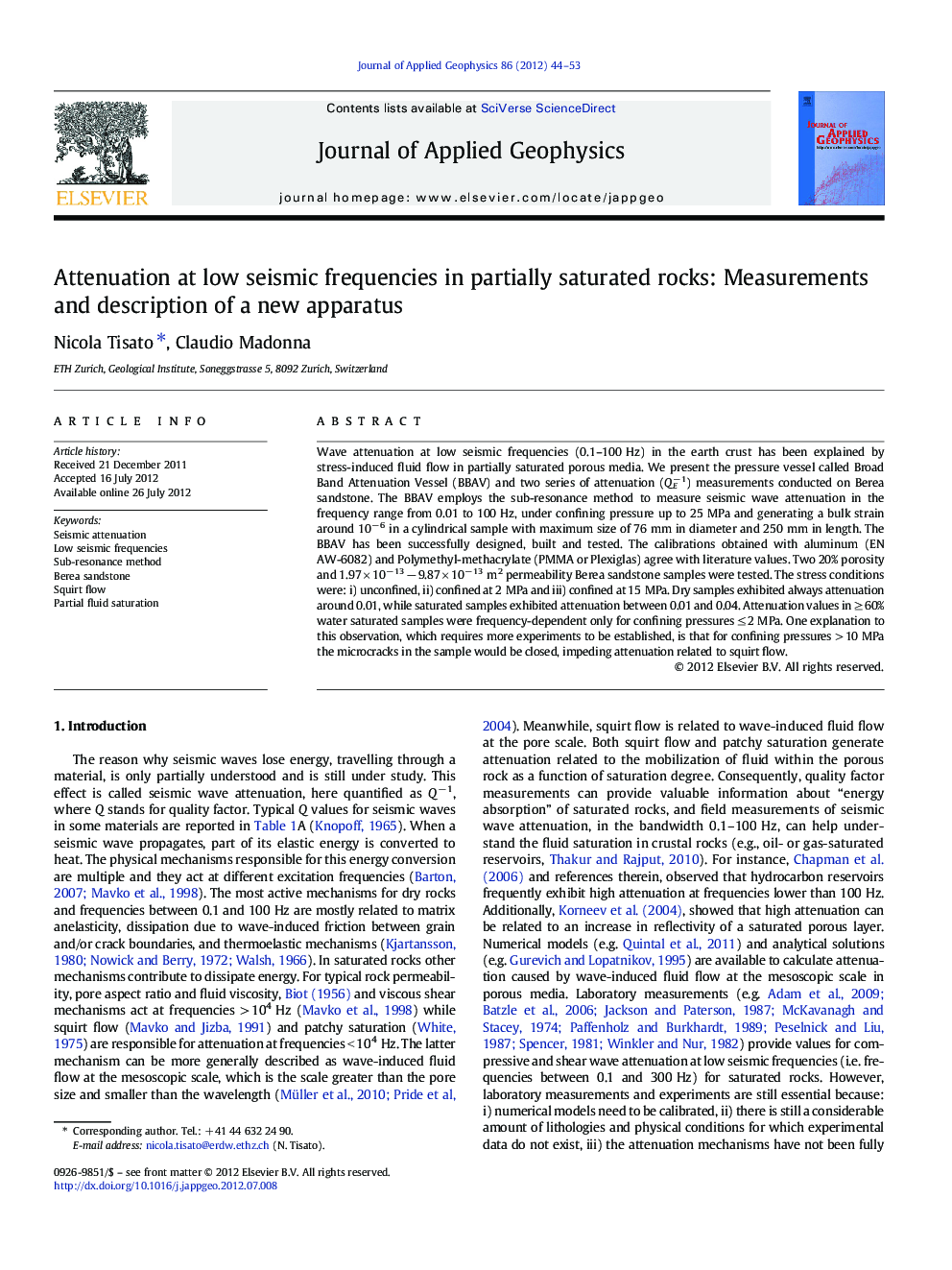 Attenuation at low seismic frequencies in partially saturated rocks: Measurements and description of a new apparatus