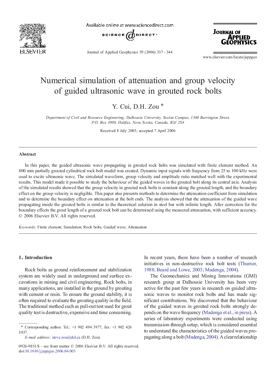 Numerical simulation of attenuation and group velocity of guided ultrasonic wave in grouted rock bolts