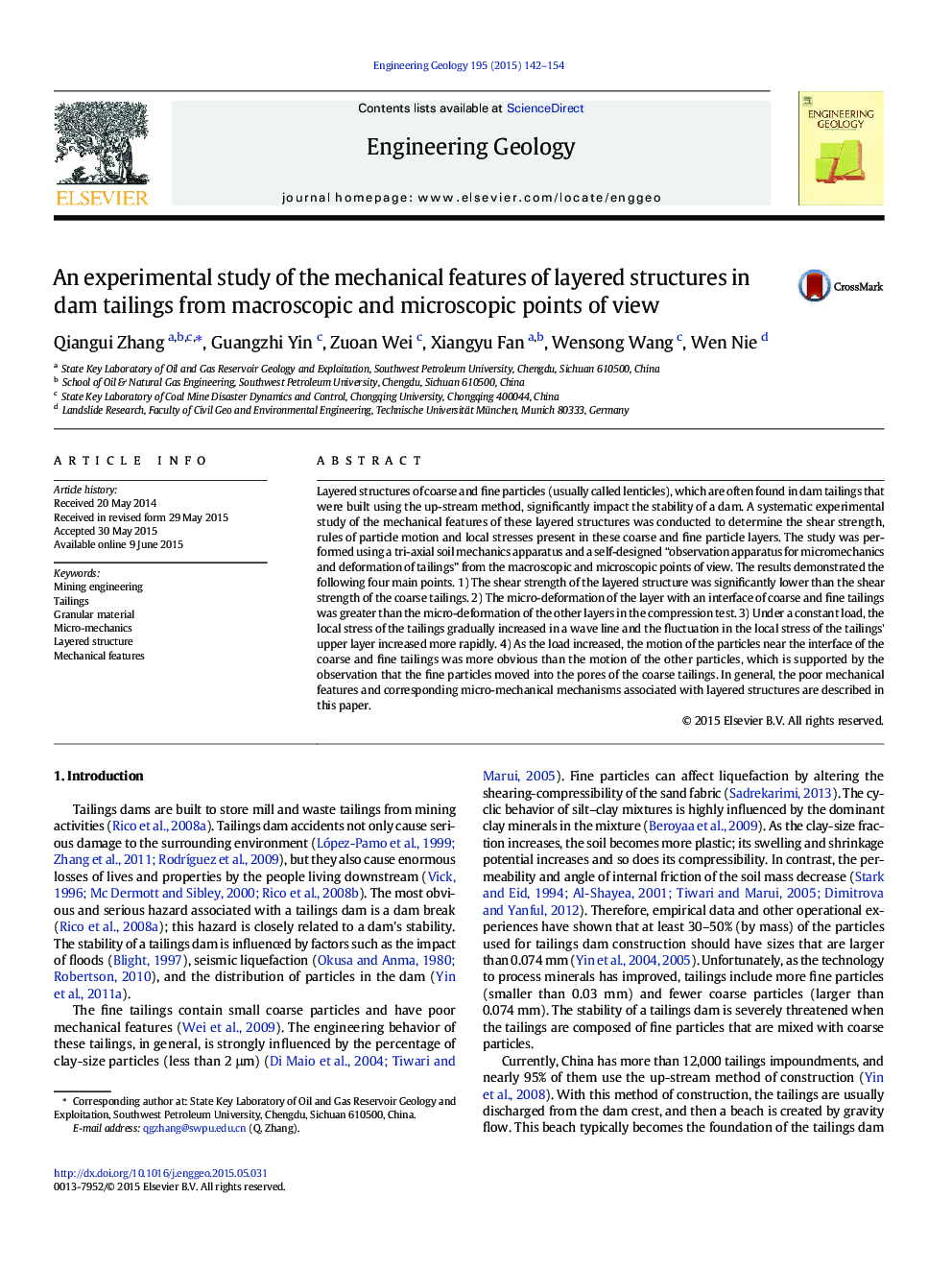 An experimental study of the mechanical features of layered structures in dam tailings from macroscopic and microscopic points of view