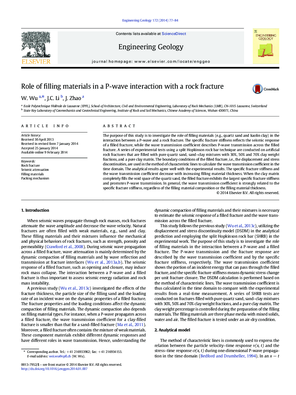 Role of filling materials in a P-wave interaction with a rock fracture