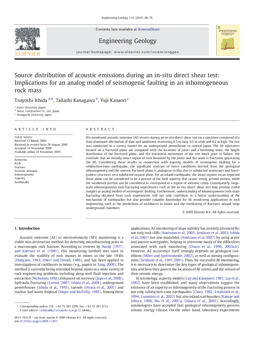 Source distribution of acoustic emissions during an in-situ direct shear test: Implications for an analog model of seismogenic faulting in an inhomogeneous rock mass