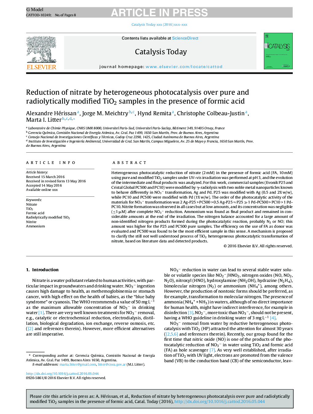 Reduction of nitrate by heterogeneous photocatalysis over pure and radiolytically modified TiO2 samples in the presence of formic acid