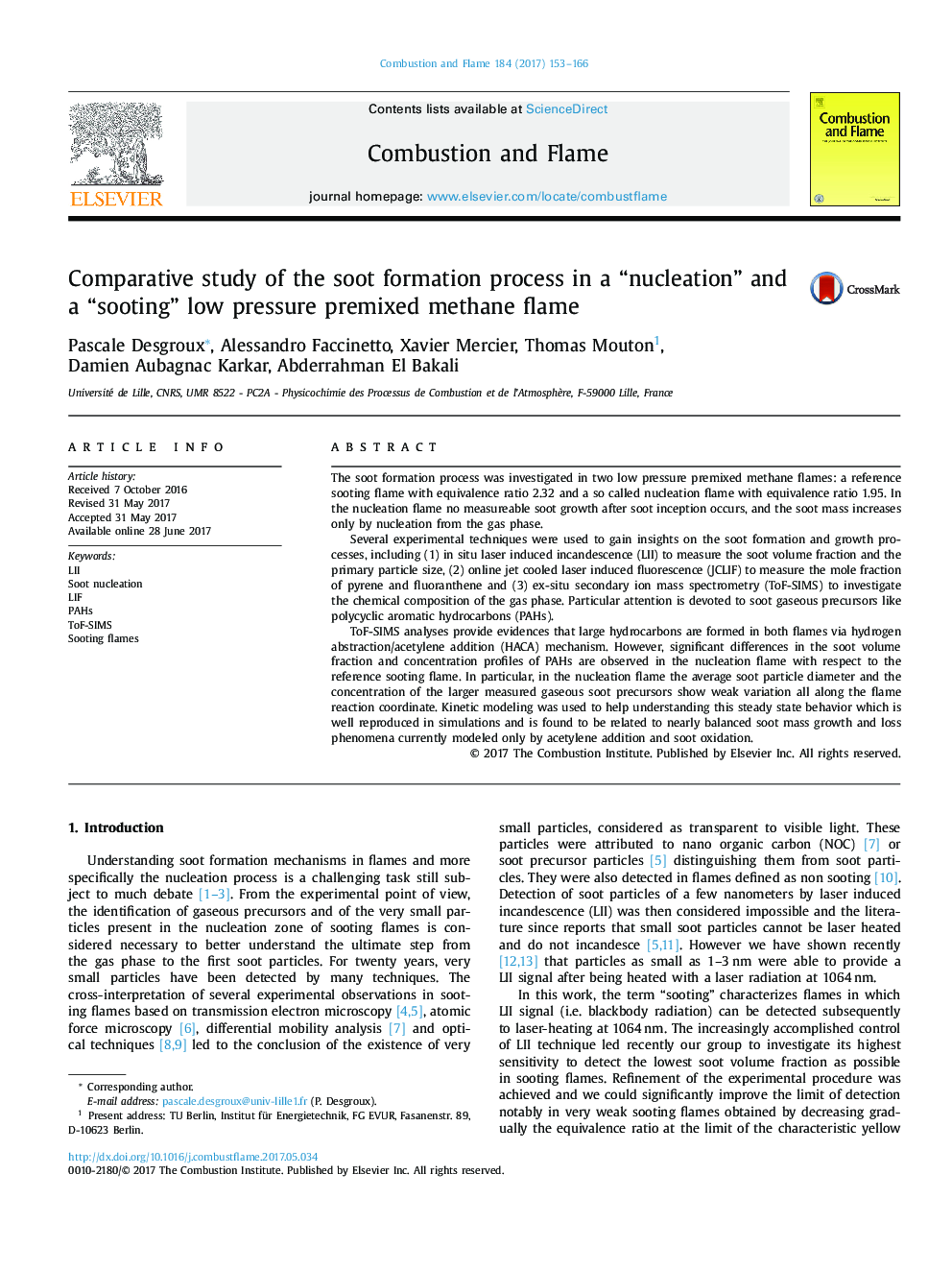 Comparative study of the soot formation process in a “nucleation” and a “sooting” low pressure premixed methane flame