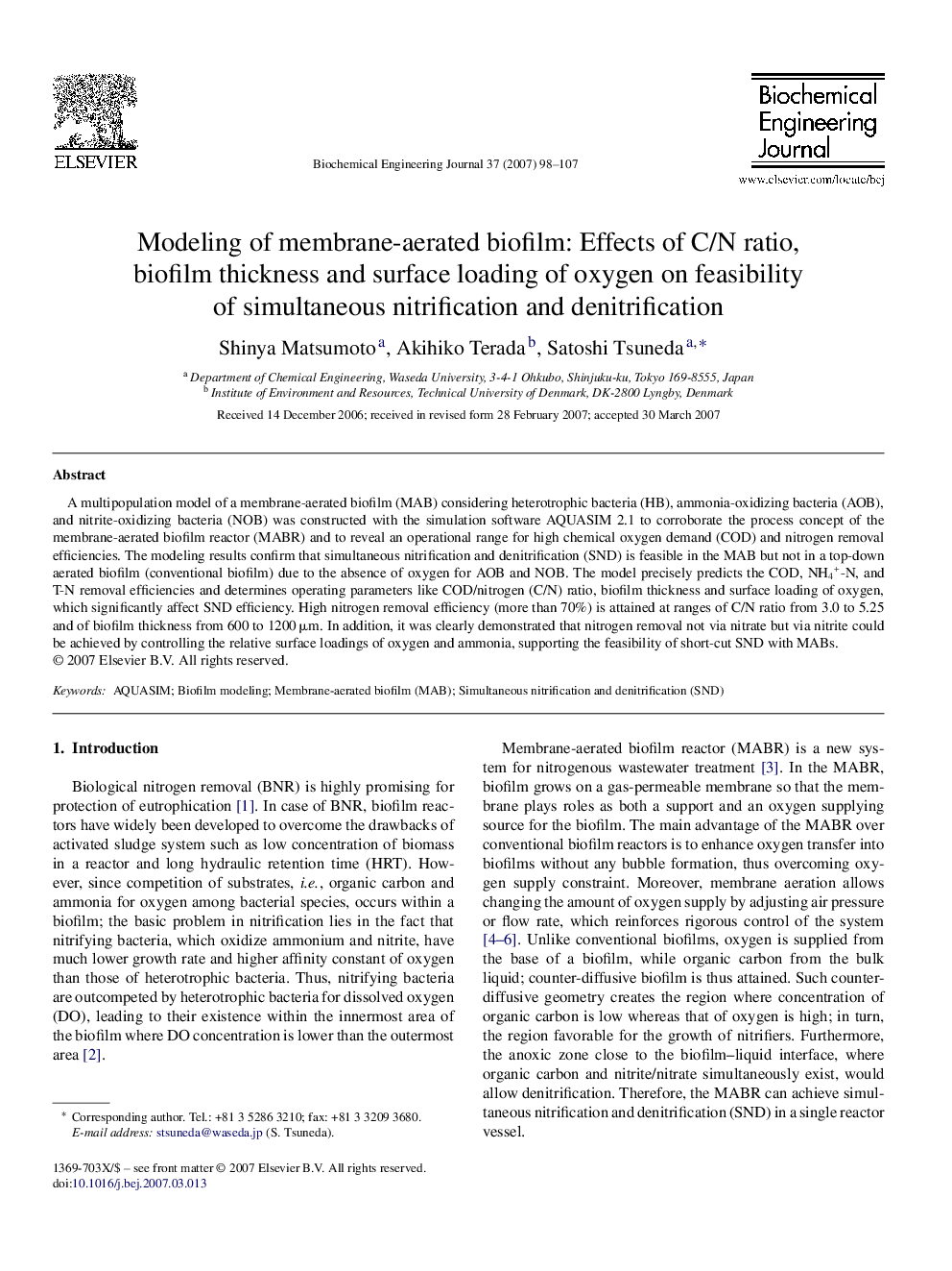 Modeling of membrane-aerated biofilm: Effects of C/N ratio, biofilm thickness and surface loading of oxygen on feasibility of simultaneous nitrification and denitrification