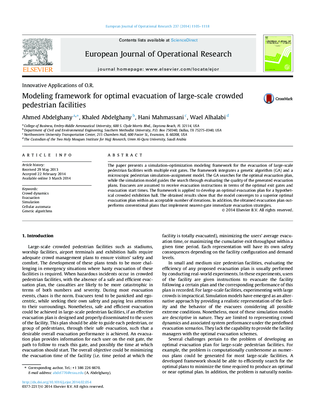 Modeling framework for optimal evacuation of large-scale crowded pedestrian facilities