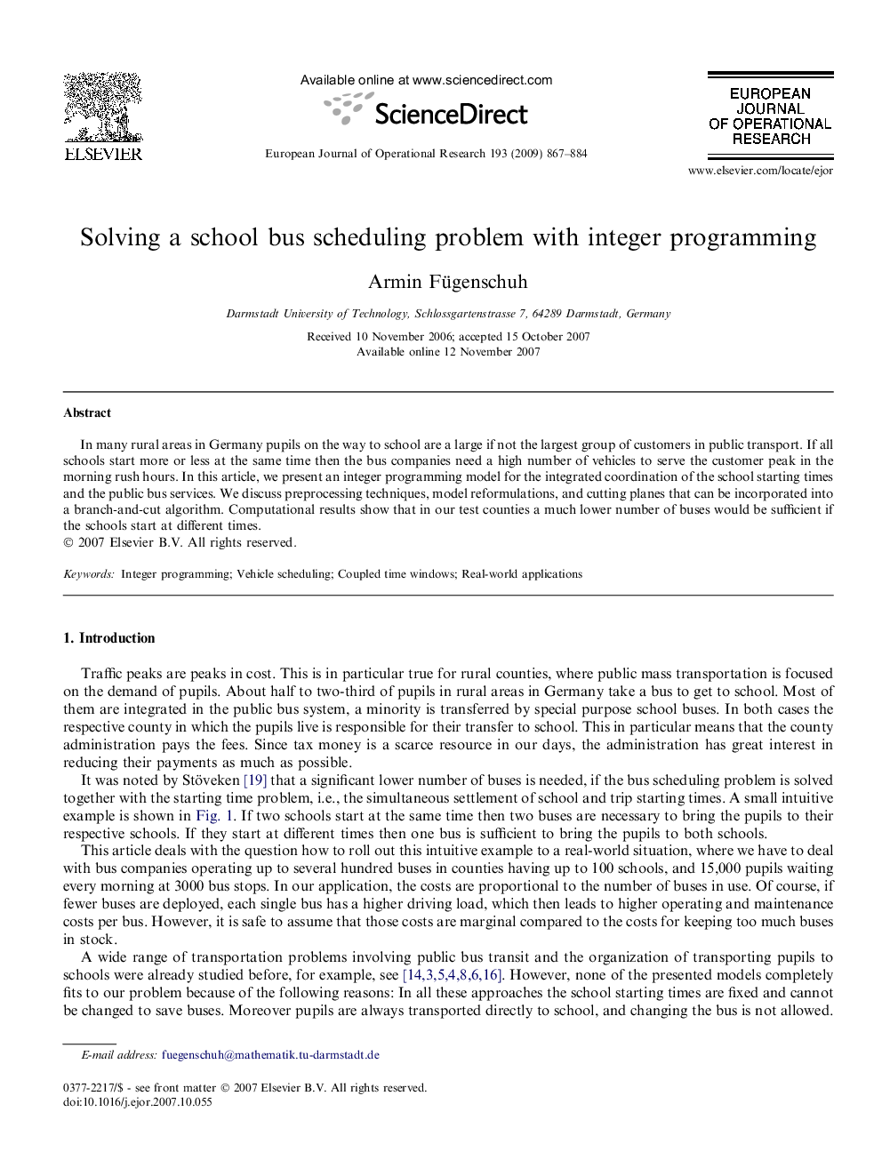 Solving a school bus scheduling problem with integer programming