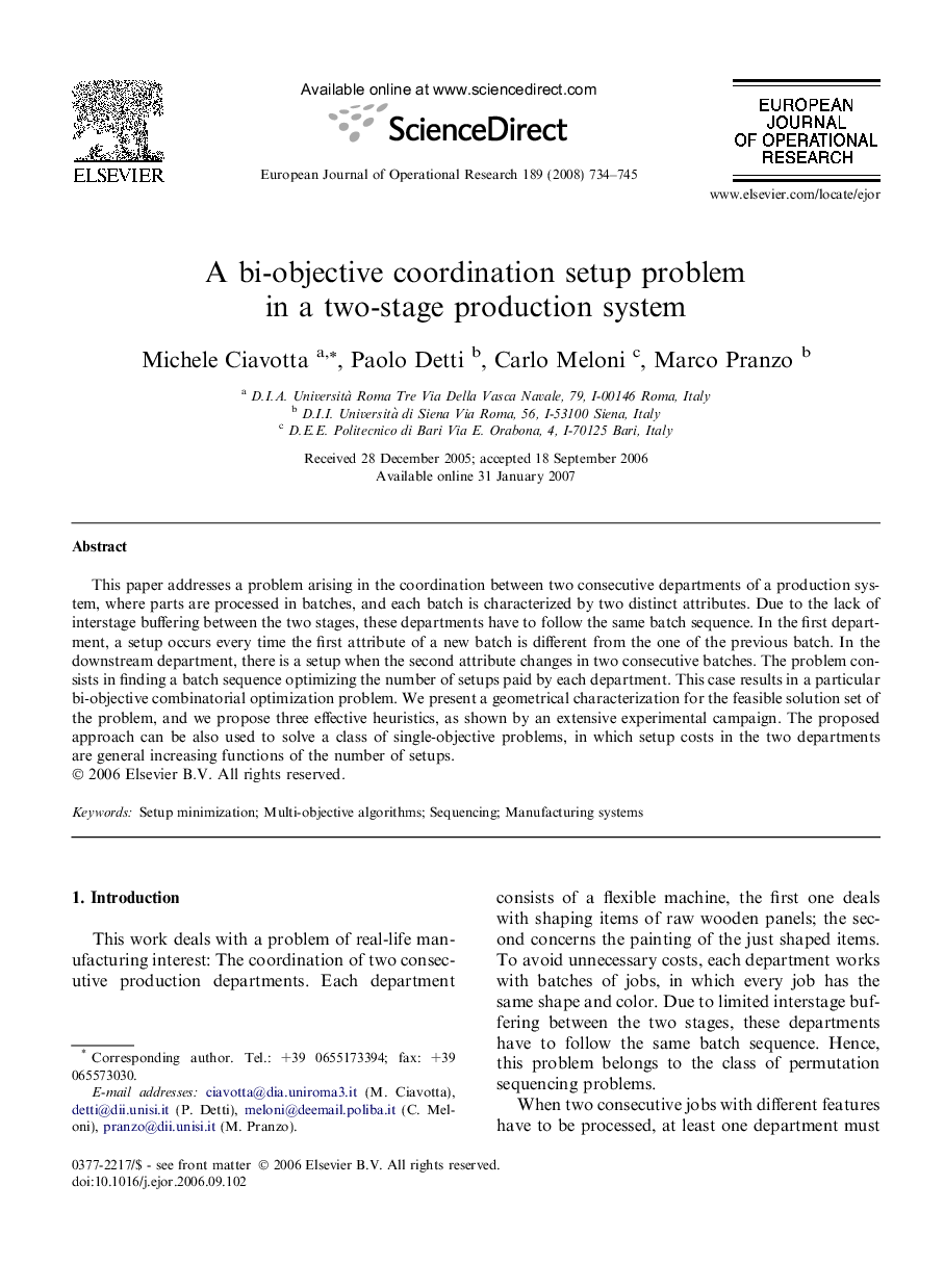 A bi-objective coordination setup problem in a two-stage production system