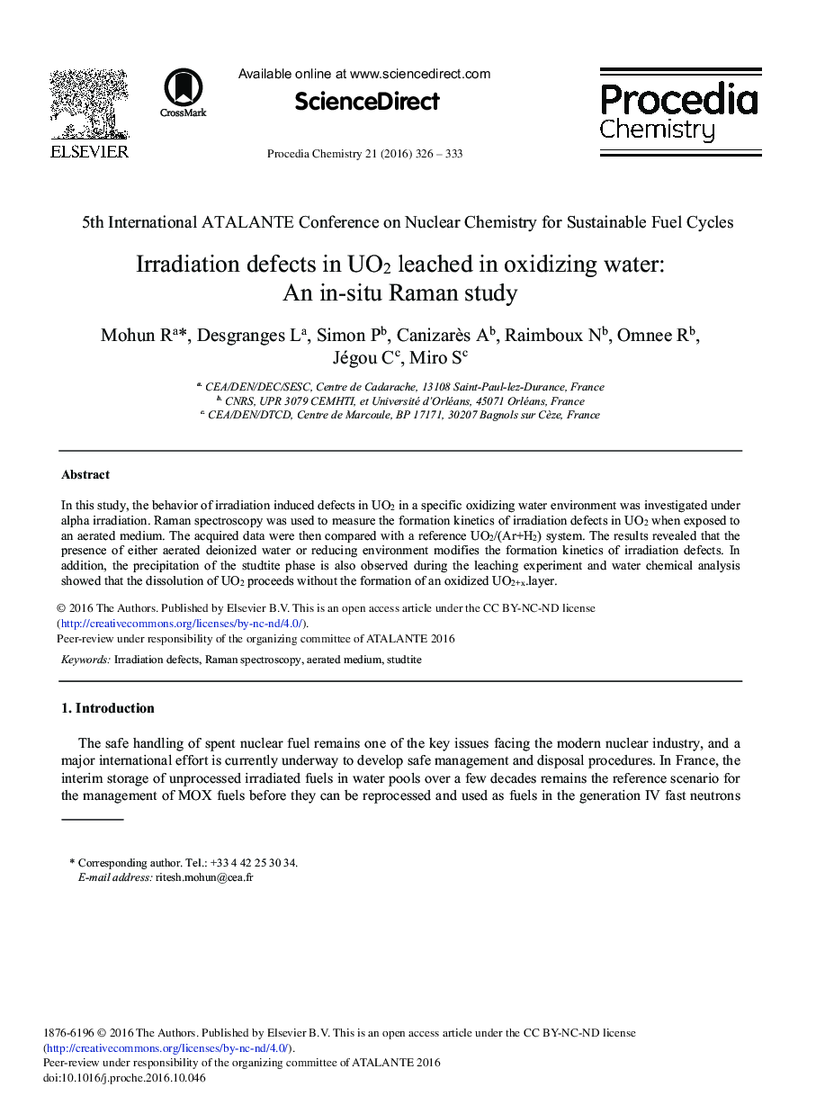 Irradiation Defects in UO2 Leached in Oxidizing Water: An in-situ Raman Study