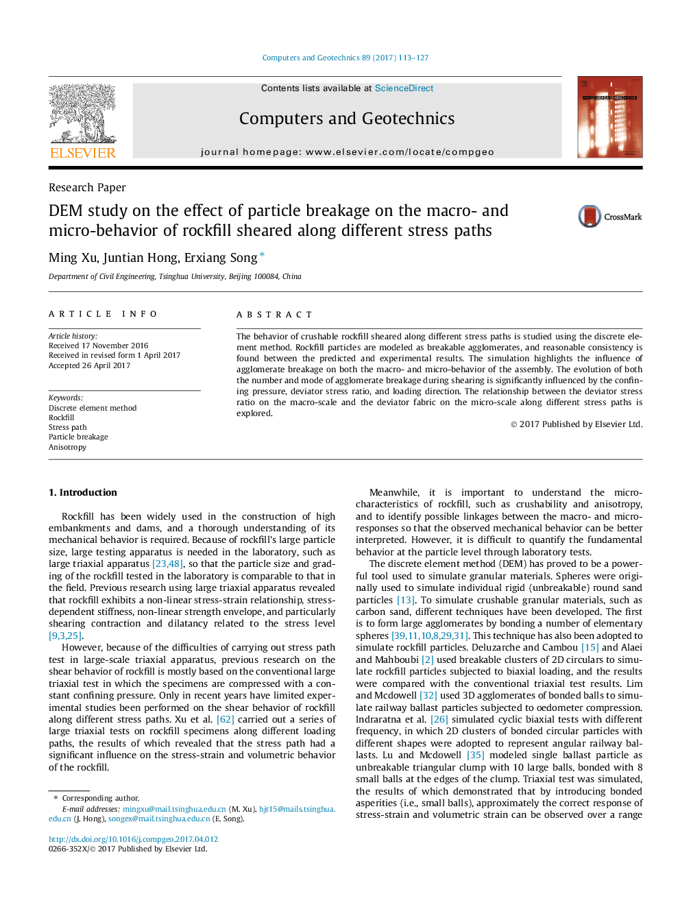 DEM study on the effect of particle breakage on the macro- and micro-behavior of rockfill sheared along different stress paths