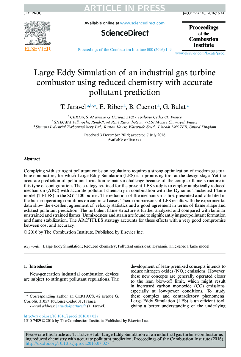 Large Eddy Simulation of an industrial gas turbine combustor using reduced chemistry with accurate pollutant prediction