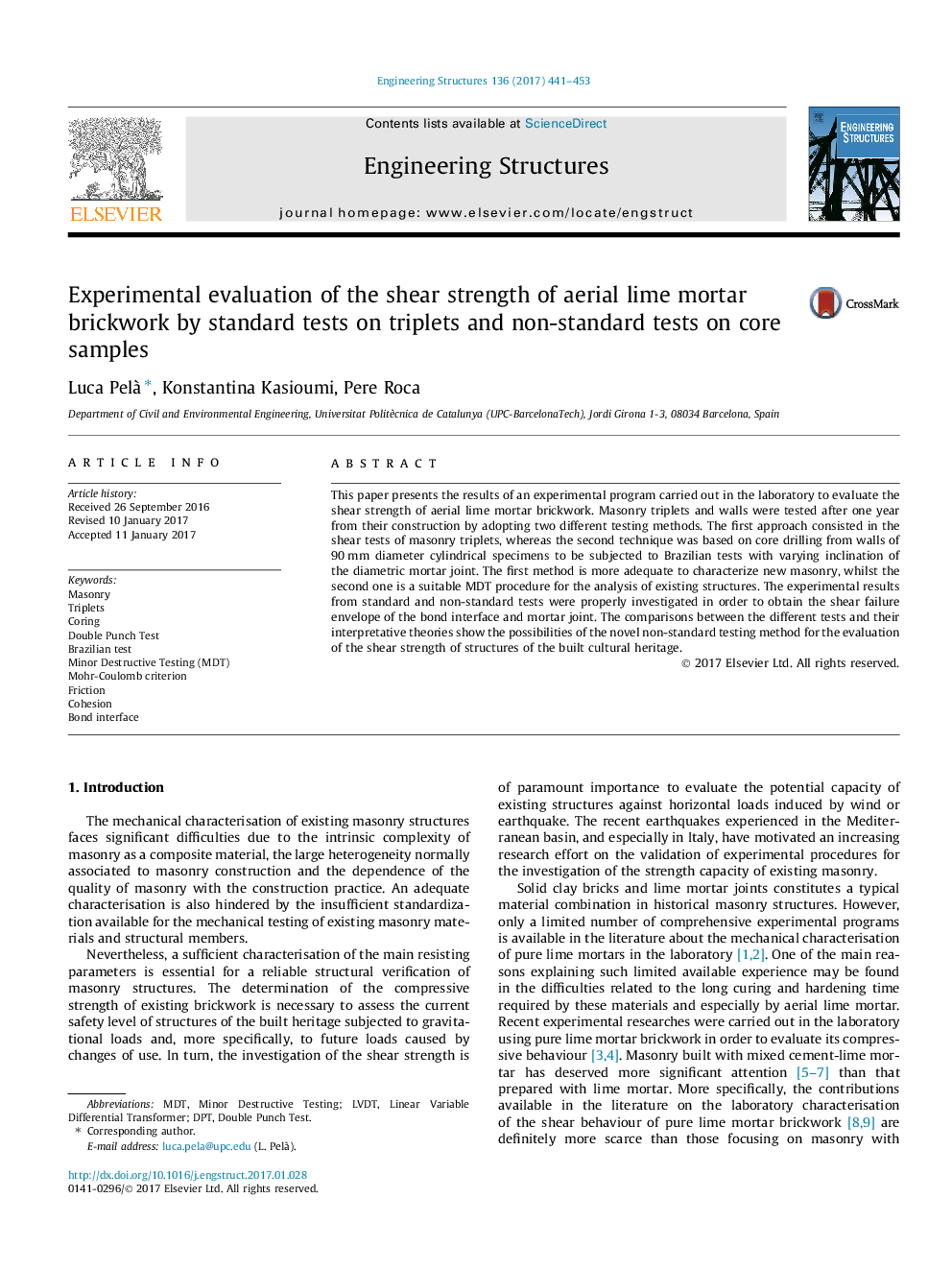 Experimental evaluation of the shear strength of aerial lime mortar brickwork by standard tests on triplets and non-standard tests on core samples