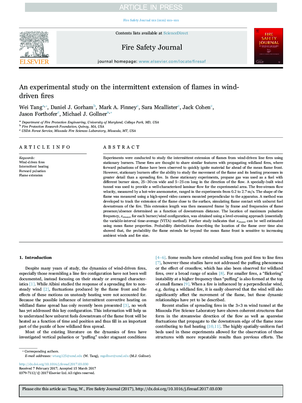 An experimental study on the intermittent extension of flames in wind-driven fires