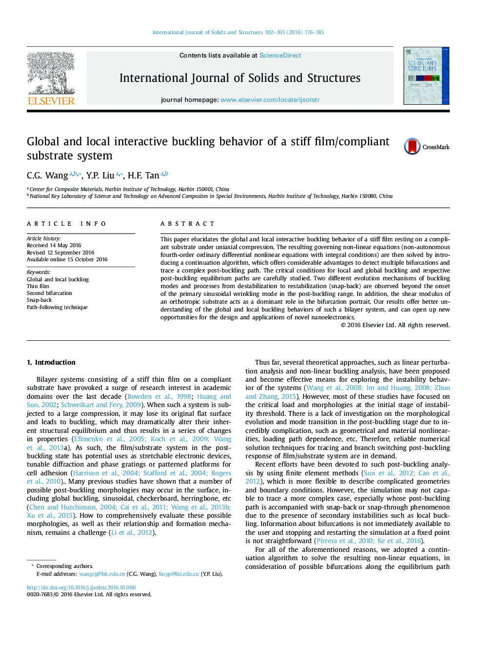 Global and local interactive buckling behavior of a stiff film/compliant substrate system