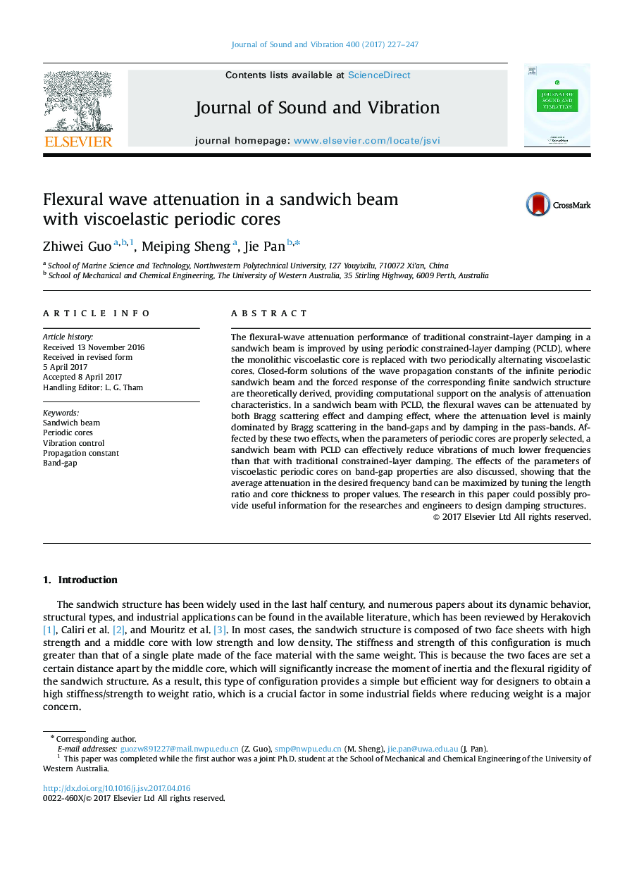 Flexural wave attenuation in a sandwich beam with viscoelastic periodic cores