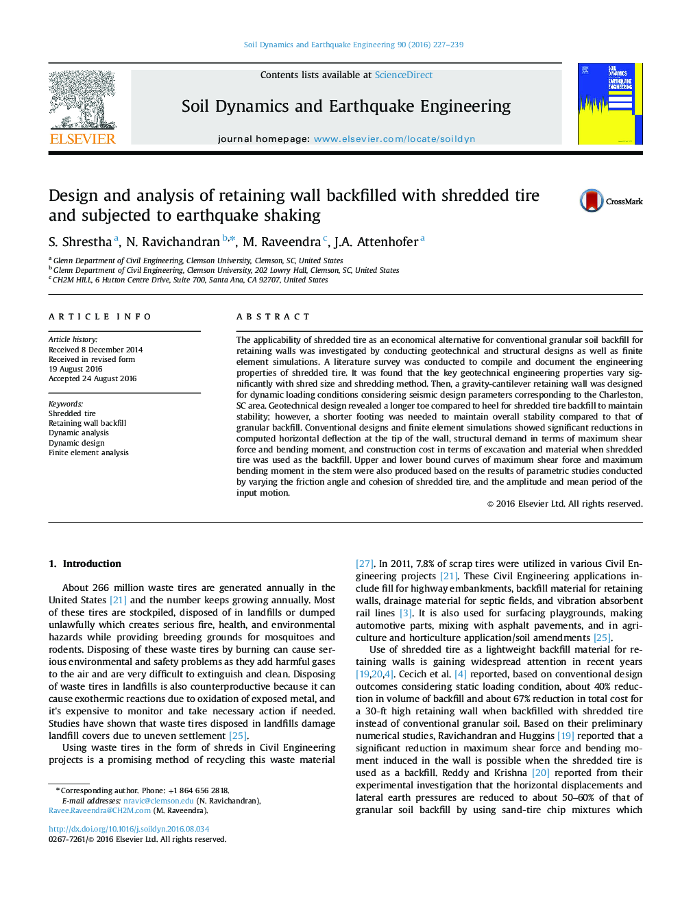 Design and analysis of retaining wall backfilled with shredded tire and subjected to earthquake shaking