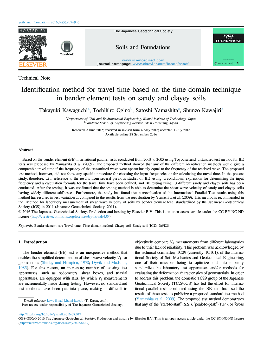 Identification method for travel time based on the time domain technique in bender element tests on sandy and clayey soils