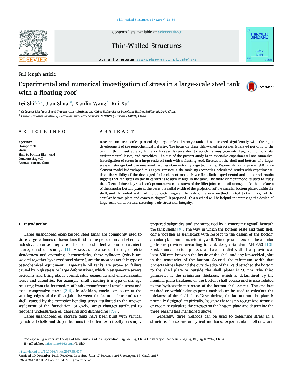 Experimental and numerical investigation of stress in a large-scale steel tank with a floating roof