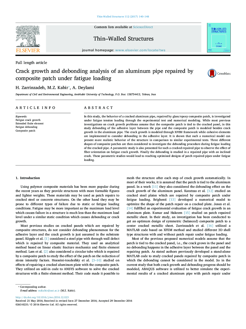 Crack growth and debonding analysis of an aluminum pipe repaired by composite patch under fatigue loading