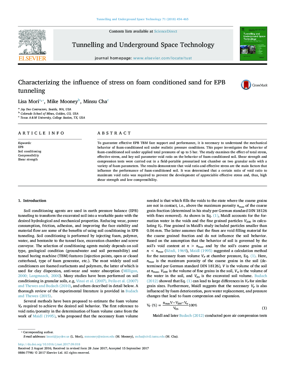 Characterizing the influence of stress on foam conditioned sand for EPB tunneling