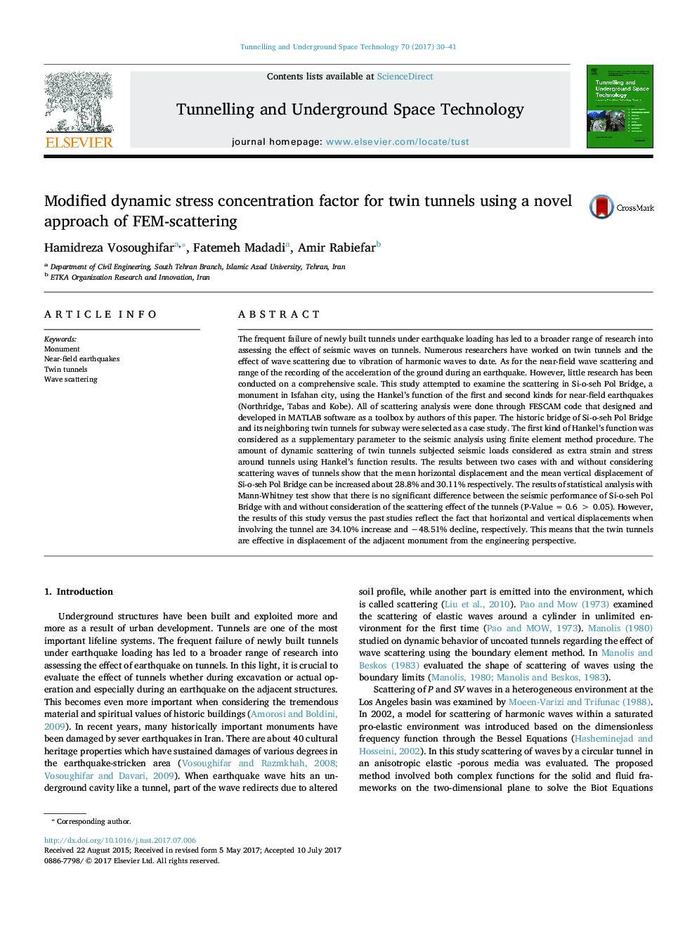 Modified dynamic stress concentration factor for twin tunnels using a novel approach of FEM-scattering