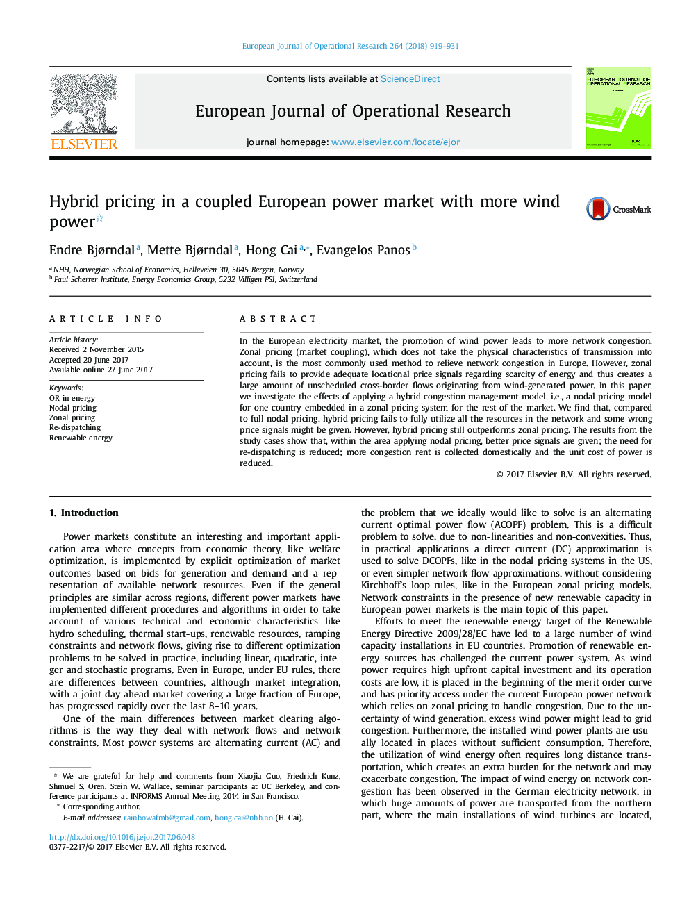 Hybrid pricing in a coupled European power market with more wind power